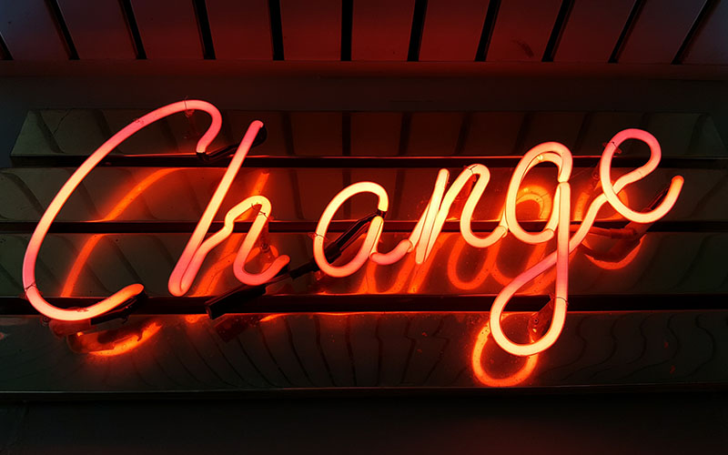 Neon sign with the word change